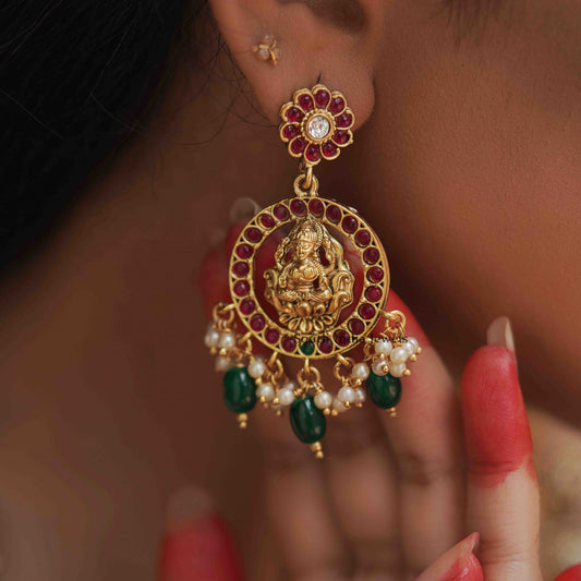 Mangalam peacock design kemp stone haram along with matching Earrings.